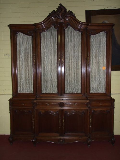 A Very Fine Quality French Walnut Breakfront Bookcase
