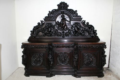 A Large Carved Oak Sideboard