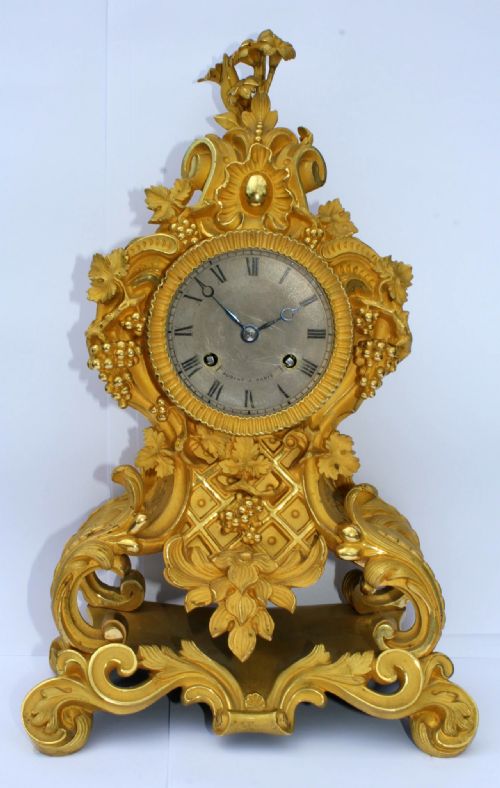 A Fine Gilt Bronze Rococo Style Mantle Clock