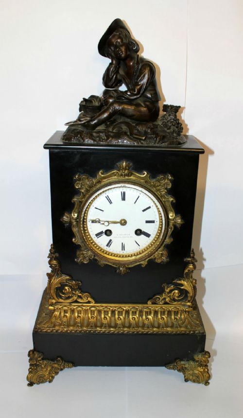 A Black Marble Mantle Clock with Bronze Figure & Gilt Bronze Mounts