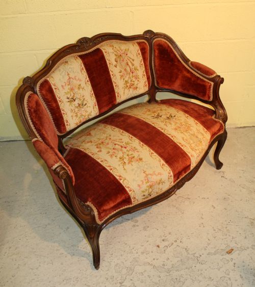 A French Carved Walnut Canopy Settee