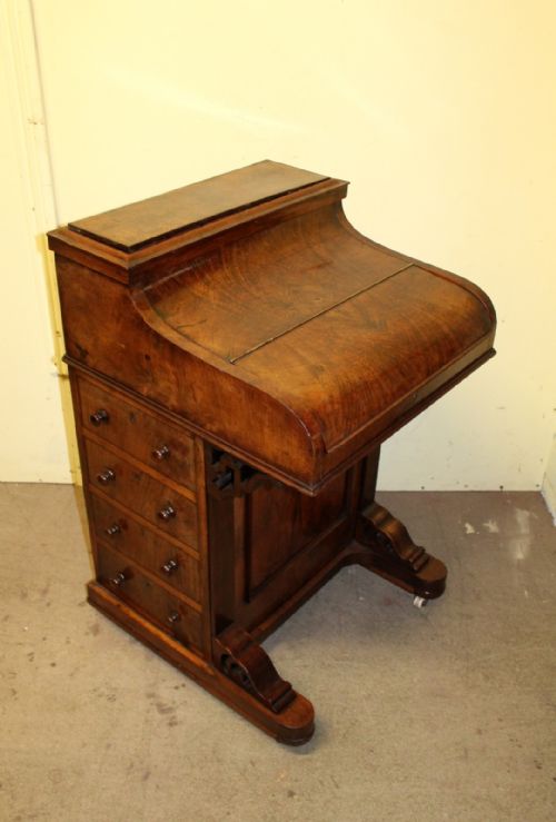 A Victorian Walnut Piano Top Davenport with Pop Up Top