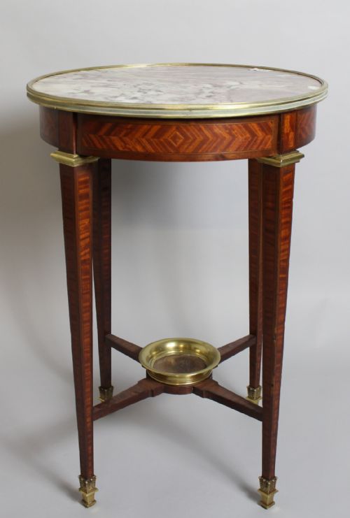 A French Marble Top Ormolu Table