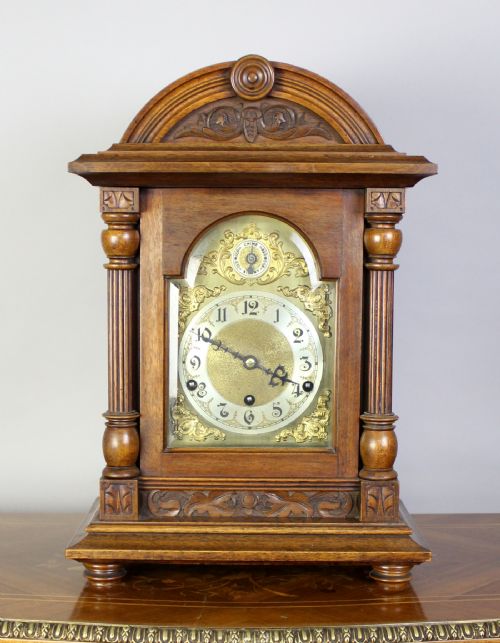 A Carved Oak Mantle Clock