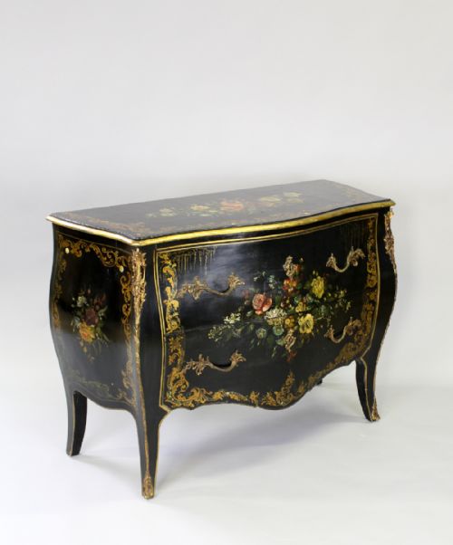 A Decorative Ebonized French Serpentine Fronted Commode