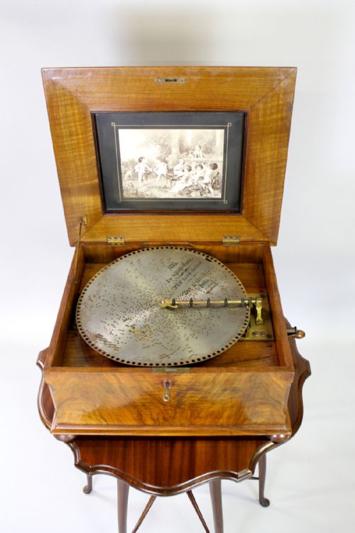 A Walnut Marquetry Cased Table Top Polyphon Music Box