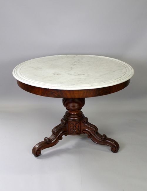 A Mahogany Marble Top Center Table