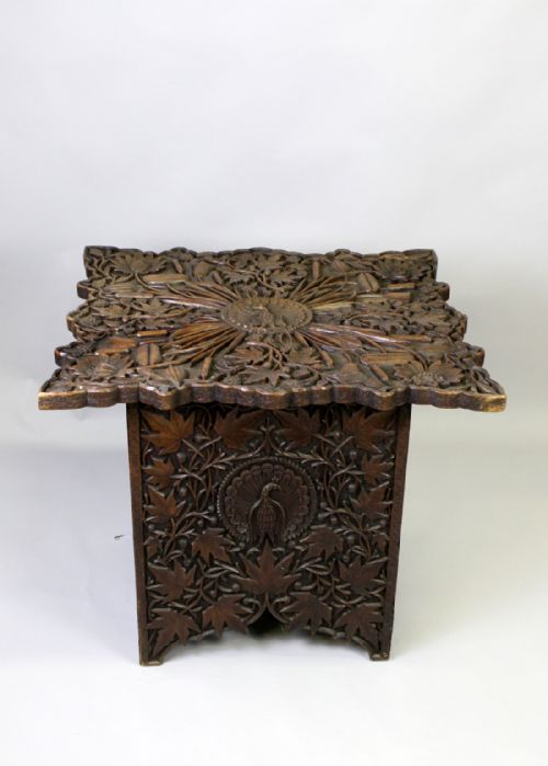 AN ORIENTAL PROFUSELY CARVED TABLE - ADDITIONAL PHOTO 1