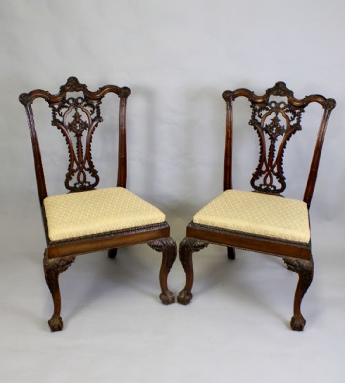 A Pair of Mahogany Carved Chippendale Revival Chairs