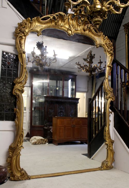 A Superb English Rococo Style Gilt Wood Mirror of Grand Proportions