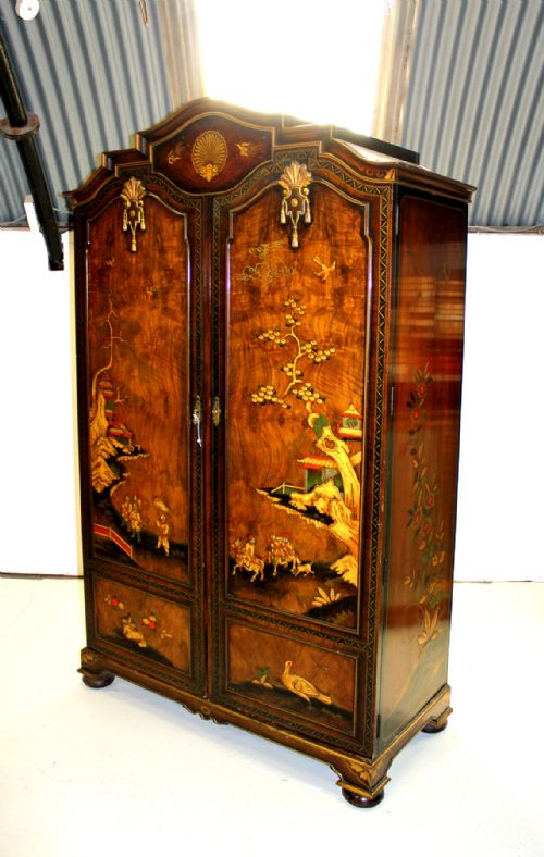 A Superb Chinoiserie Decorated and Burr Walnut Wardrobe by Maple & Co