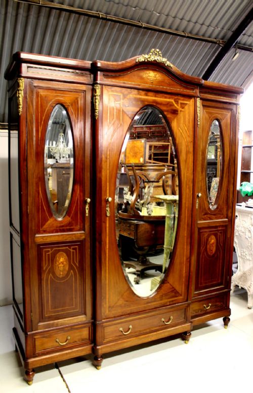 A Lovely French Mahogany Inlaid and Ormolu Mounted Wardrobe