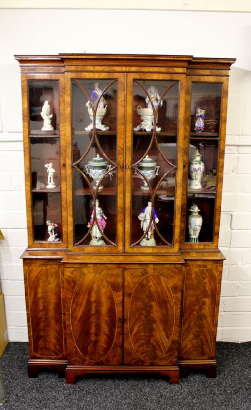 A Unique Size Stunning Flamed Mahogany Breakfront Bookcase / Cabinet