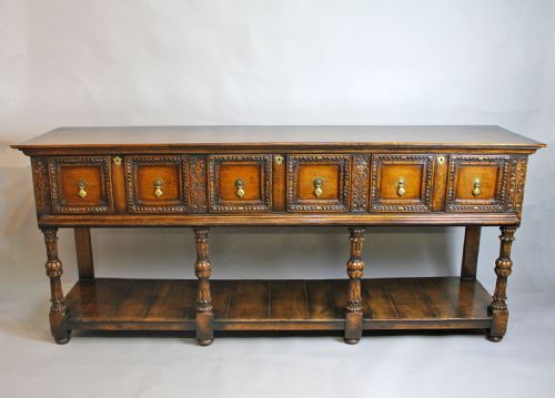 A Solid Oak Dresser Base / Server in Jacobean Manner