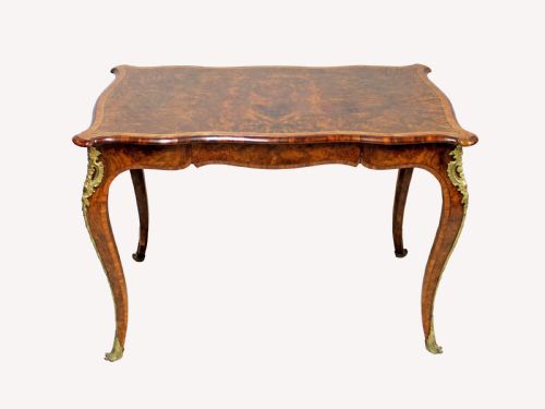 A Beautiful 19th Century Burr Walnut Table with Gilt Bronze Mounts