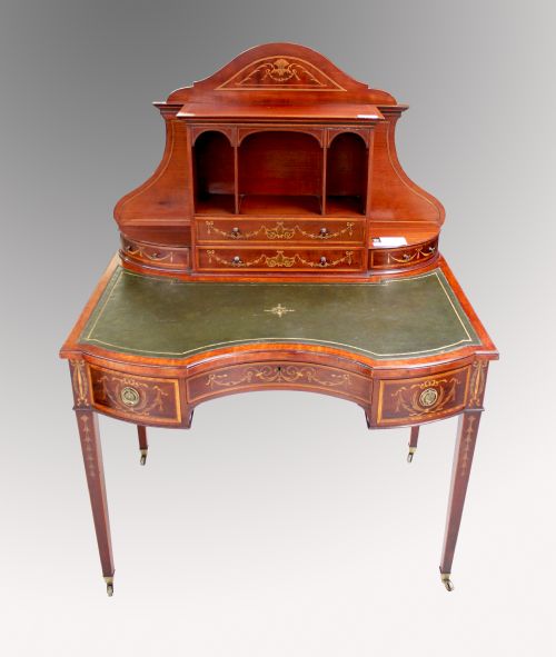 A Beautiful Mahogany Inlaid Concave Writing Desk by Edwards and Roberts