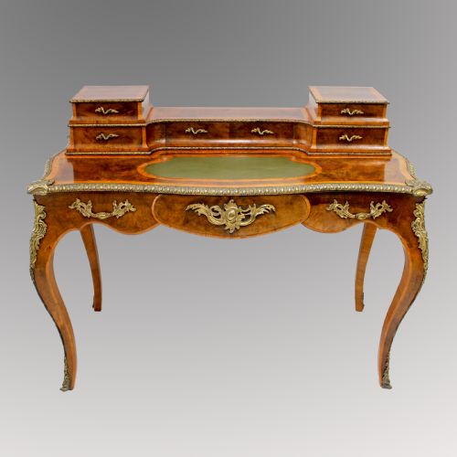 A Wonderful French Burr Walnut Serpentine Writing Table / Desk with Ormolu Mounts