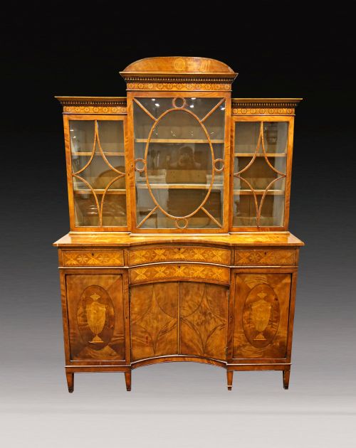 A Beautiful 19th Century English Satinwood Concave Bookcase