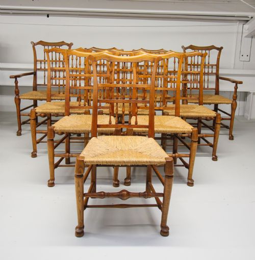 A Set of Ten Ash Rush Seat Spindle Back Chairs