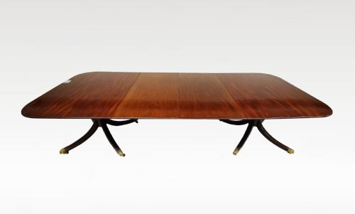 A Mahogany Twin Pillar Dining Table with Two Extra Leafs