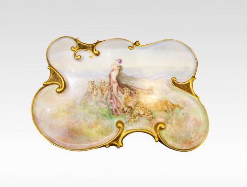 A Porcelain Plaque of Scrolling Form Stamped a H Langton