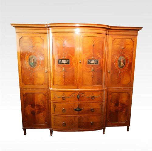 A Satinwood Painted Wardrobe by Maple and Co