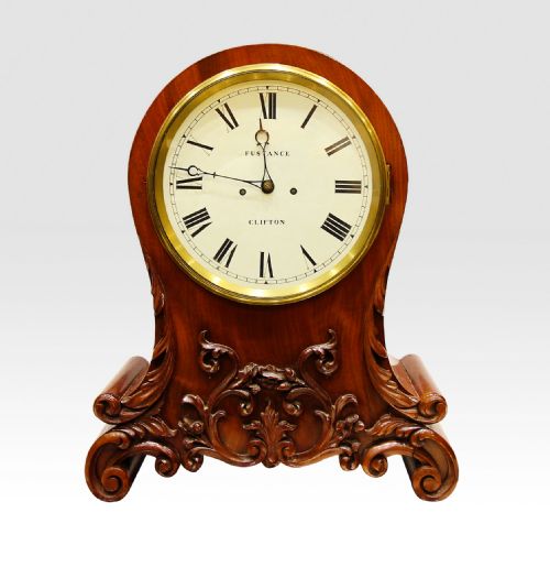 A Carved Mahogany Twin Fusee Mantle Clock