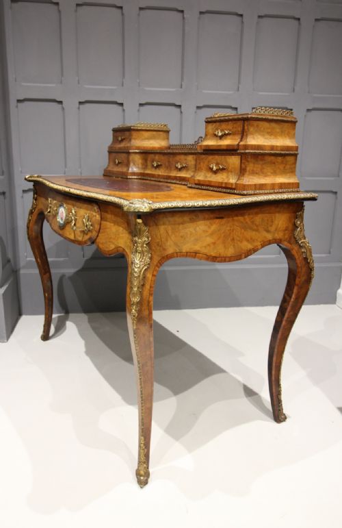 A Victorian Walnut Writing Table / Desk with Porcelain Plaque