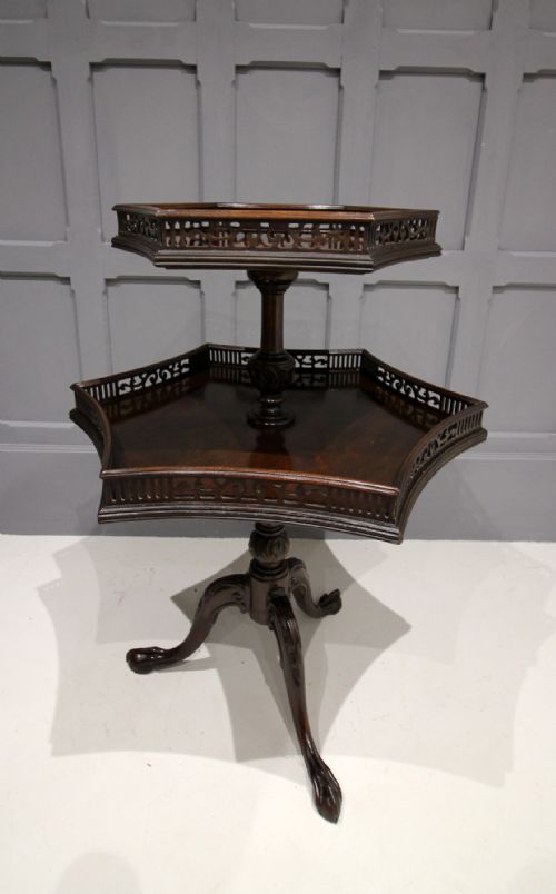 A Flamed Mahogany Two Tier Etagere Table