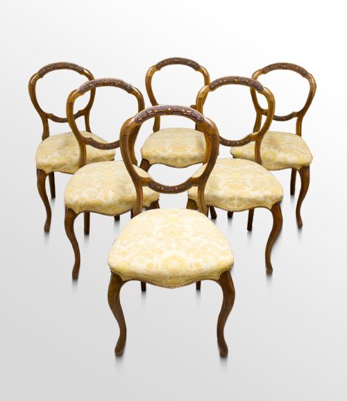 Six Victorian Carved Walnut Balloon Back Chairs