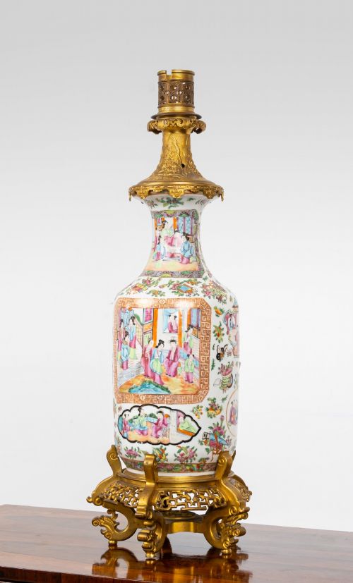 fig 1. A nineteenth-century Rose Medallion porcelain vase mounted as a table lamp with an ornate gilt bronze base and collar.