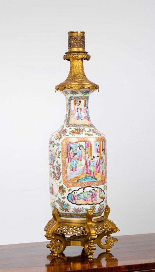 fig 2. A nineteenth-century Rose Medallion porcelain vase mounted as a table lamp with an ornate gilt bronze base and collar.