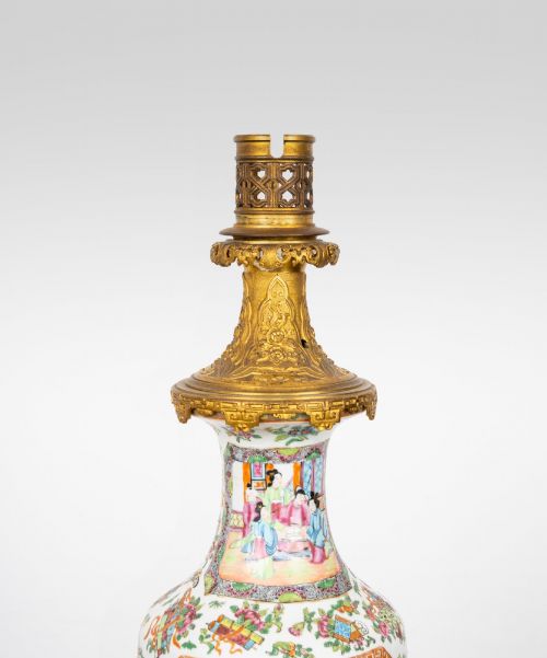 fig 4. A nineteenth-century Rose Medallion porcelain vase mounted as a table lamp with an ornate gilt bronze base and collar.