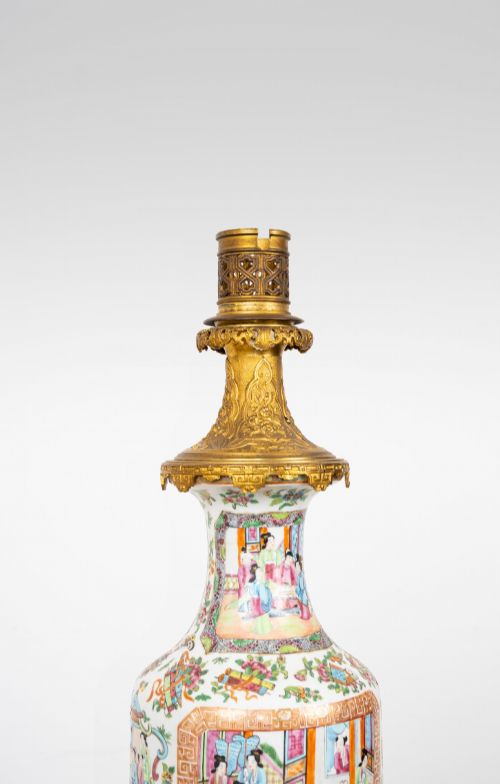 fig 5. A nineteenth-century Rose Medallion porcelain vase mounted as a table lamp with an ornate gilt bronze base and collar.