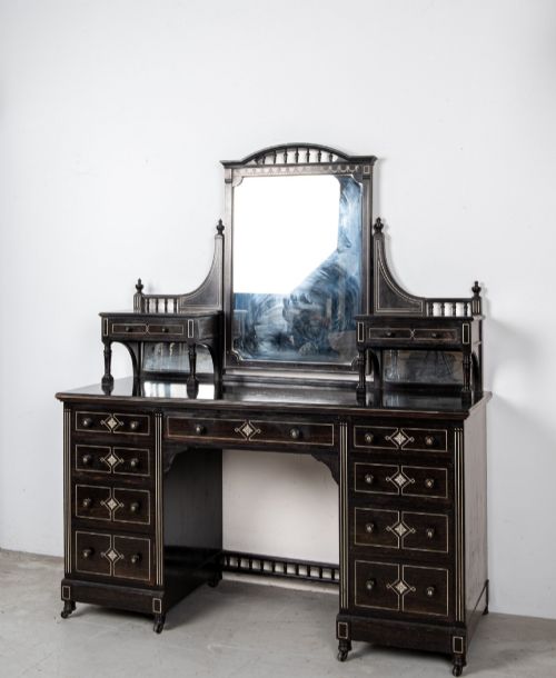 fig 2. A six-piece late Victorian ebonised bedroom suite featuring bone inlay, comprising a half-tester bed, mirror wardrobe, dressing table, marble-top washstand, nightstand, and towel rail.