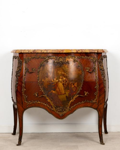 fig 1. A French Louis XV revival bombee commode in kingwood with gilt-bronze mounts, a central hand-painted Vernis Martin scene, and a marble top.
