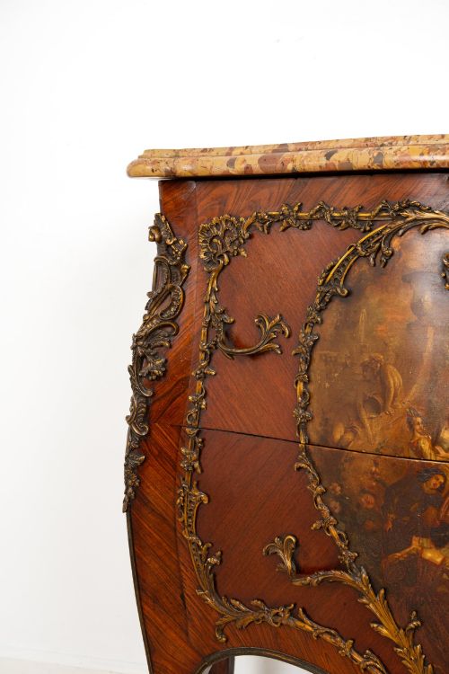 fig 6. A French Louis XV revival bombee commode in kingwood with gilt-bronze mounts, a central hand-painted Vernis Martin scene, and a marble top.