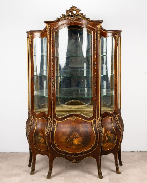 fig 1. A French Louis XV style Vernis Martin bombe vitrine display cabinet featuring kingwood veneer, gilt-bronze mounts, glass panels, and hand-painted figurative scenes.