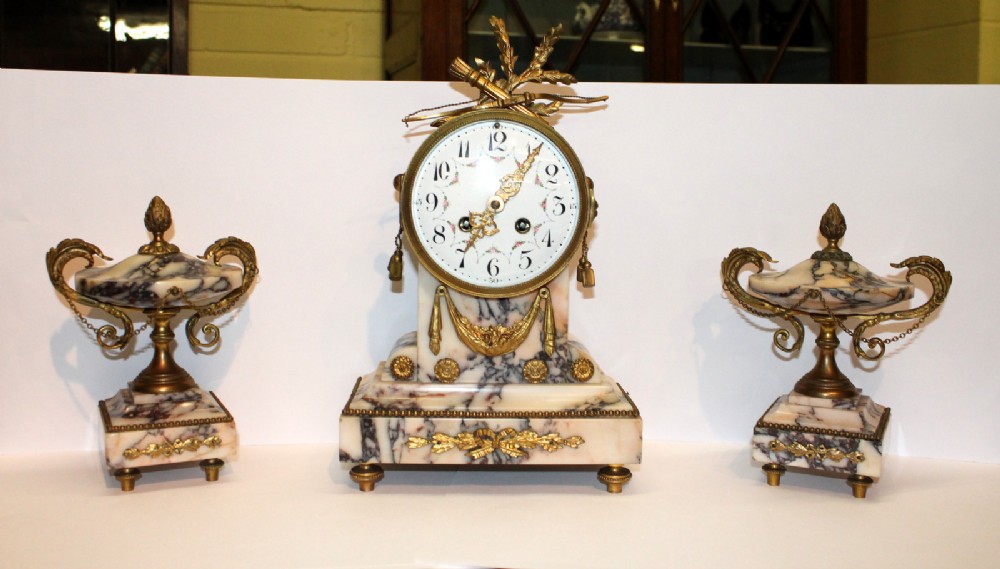 A French Marble & Ormolu Garniture Clock Set