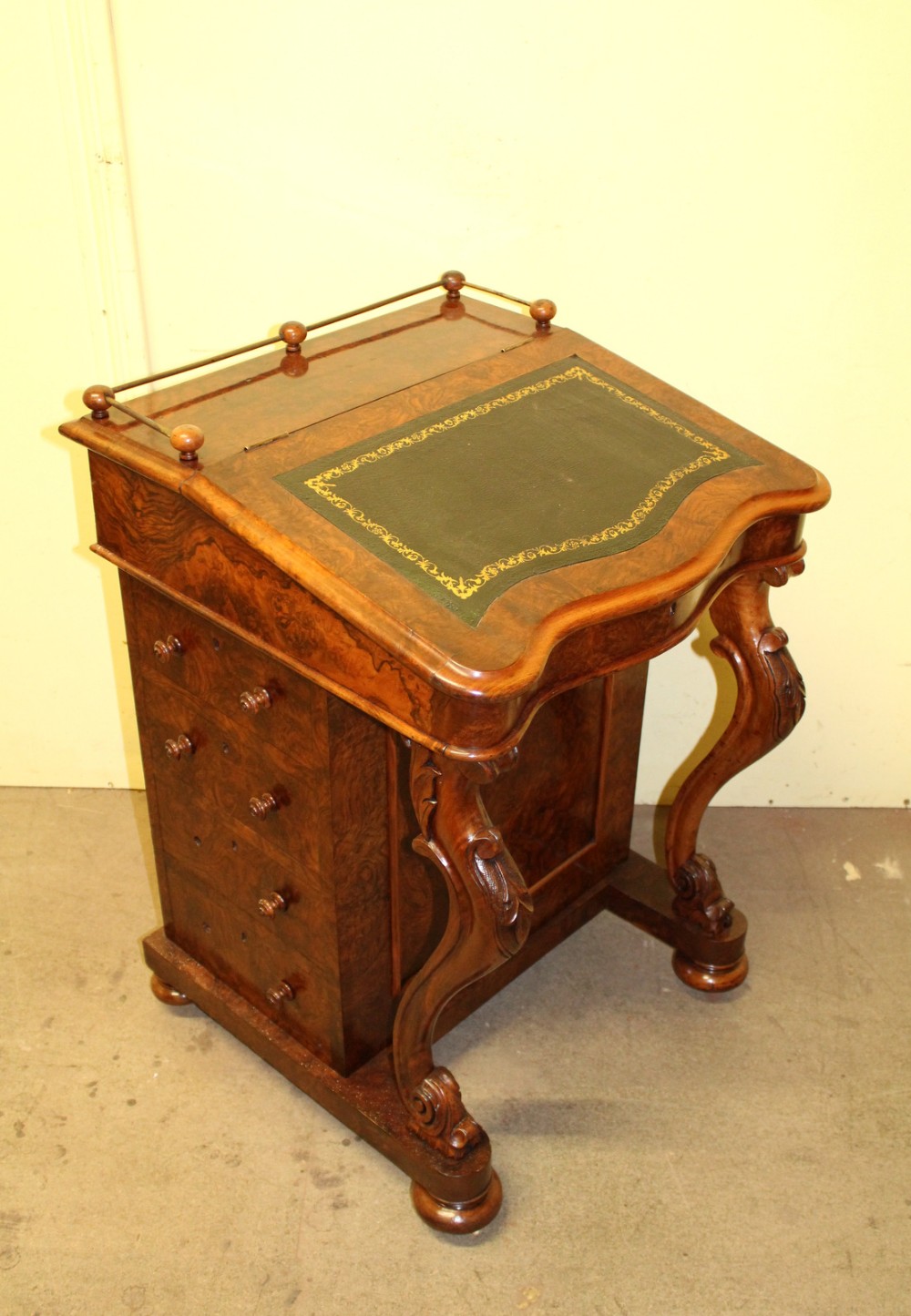 A VICTORIAN BURR WALNUT DAVENPORT