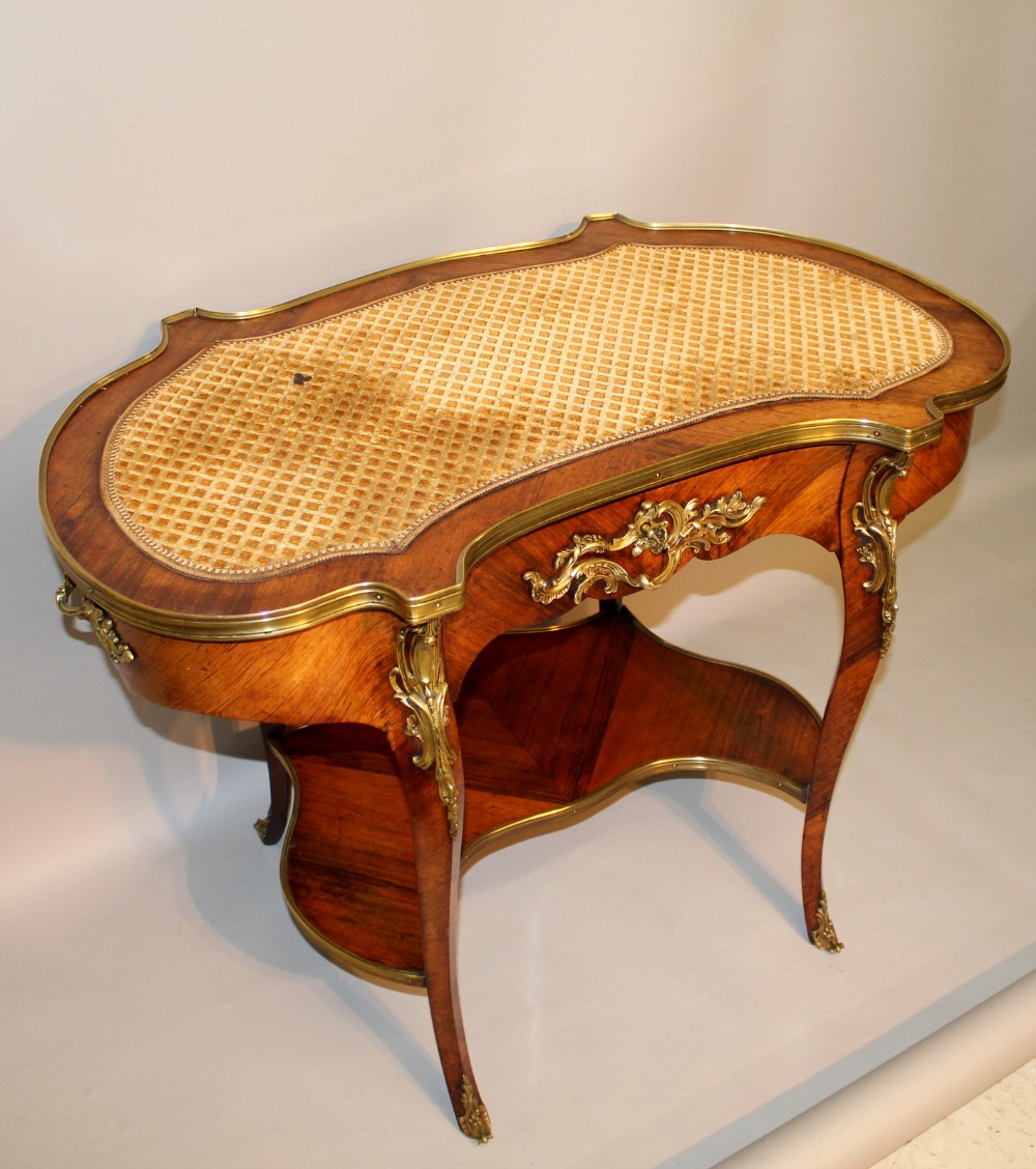 A French kidney Shaped Kingwood Writing Table