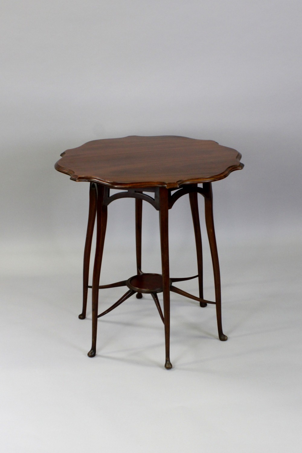 A Mahogany Occasional Table In The Manner Of George Jack