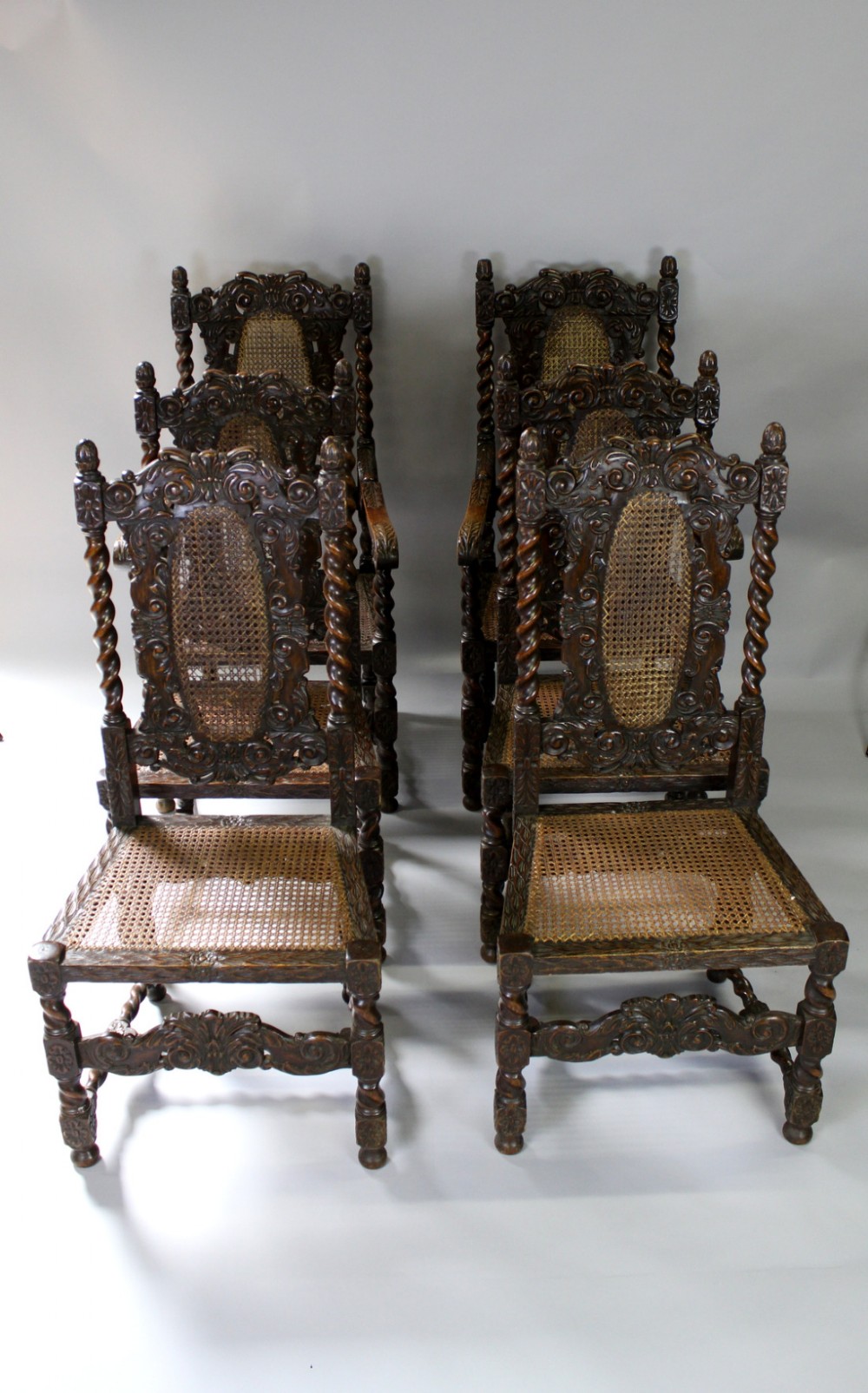 A Set Of Six Carved Oak Chairs