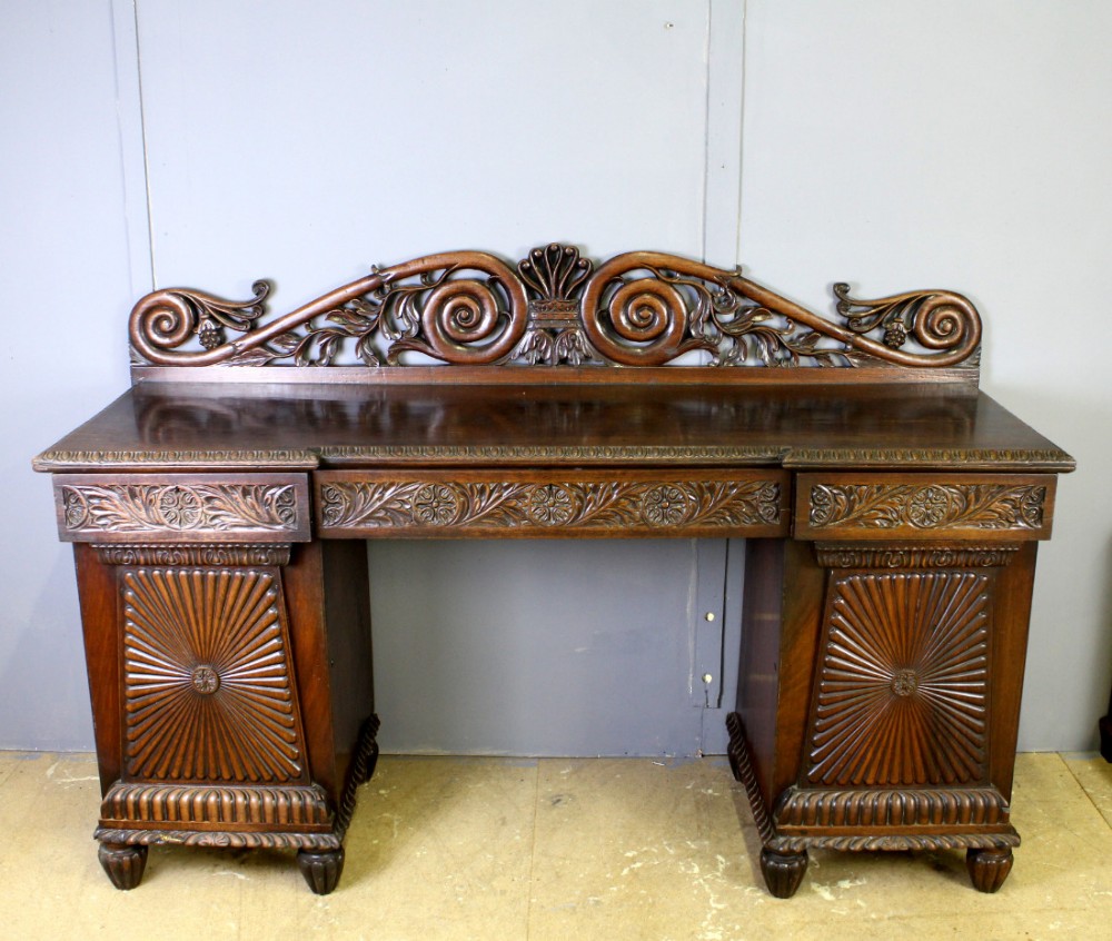 A COLONIAL PADAUK & ROSEWOOD PEDESTAL SIDEBOARD 