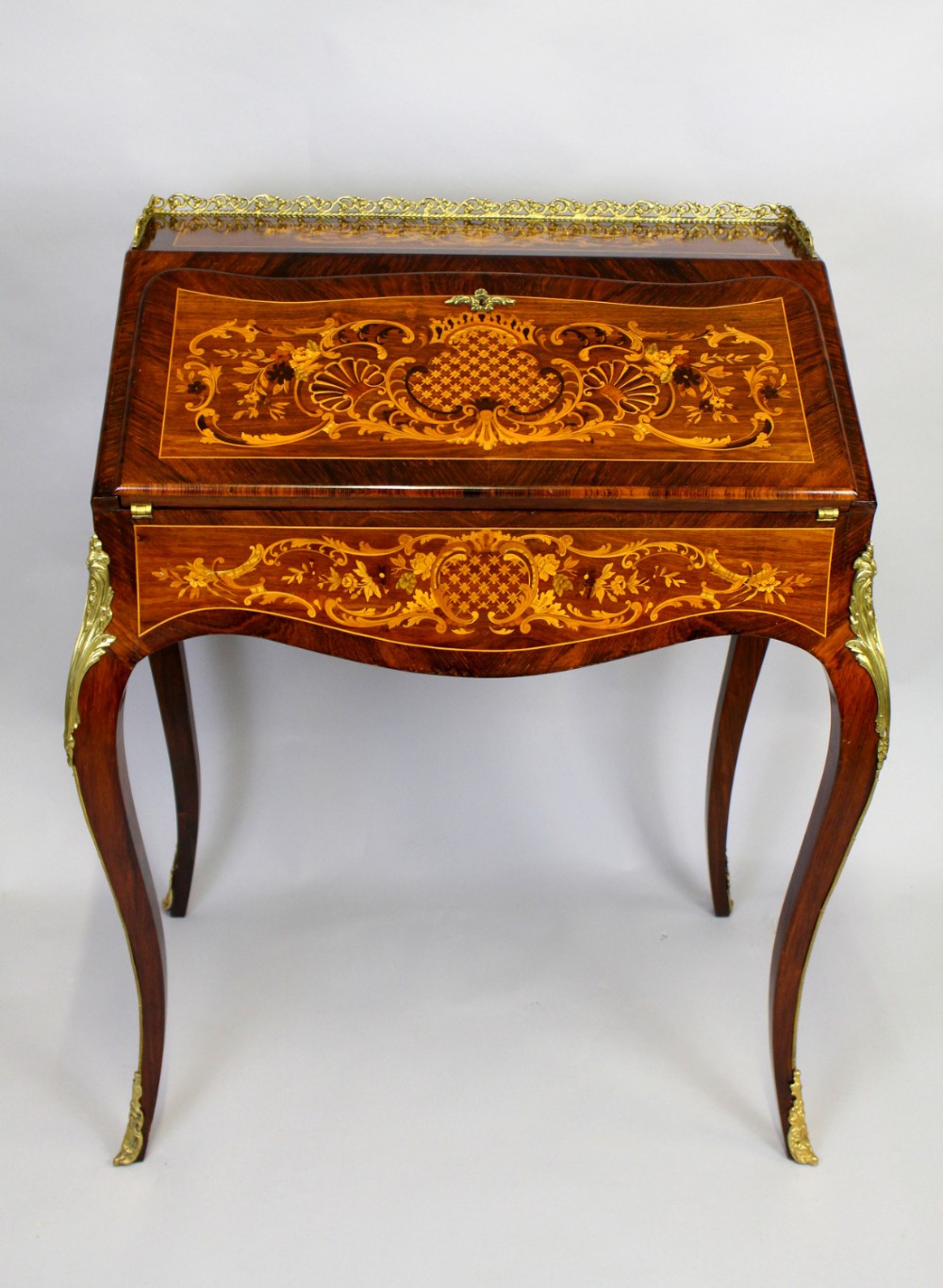 A FRENCH ROSEWOOD AND MARQUETRY BUREAU DE DAME 