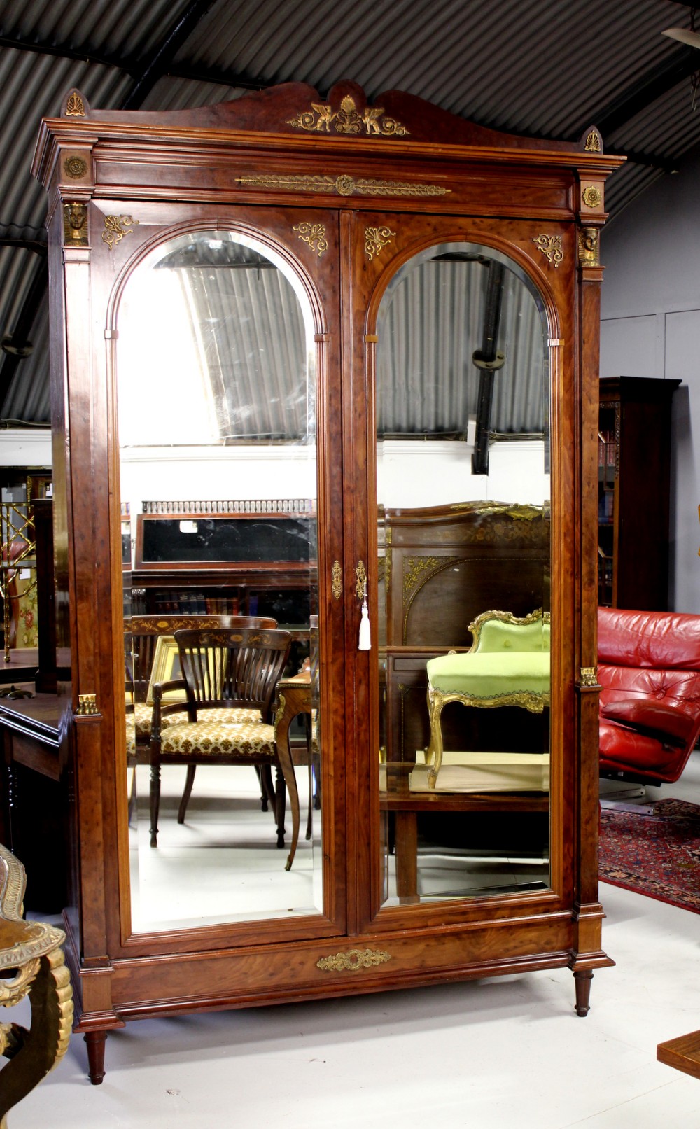 A LOVELY FRENCH EMPIRE ORMOLU MOUNTED TWO DOOR WARDROBE 