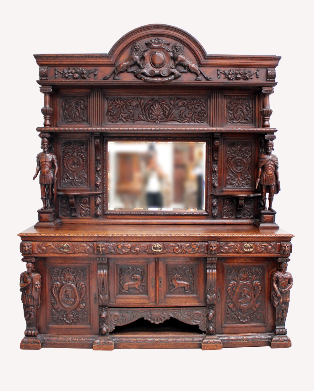 A SUPERB CARVED OAK MIRROR BACK SIDEBOARD 