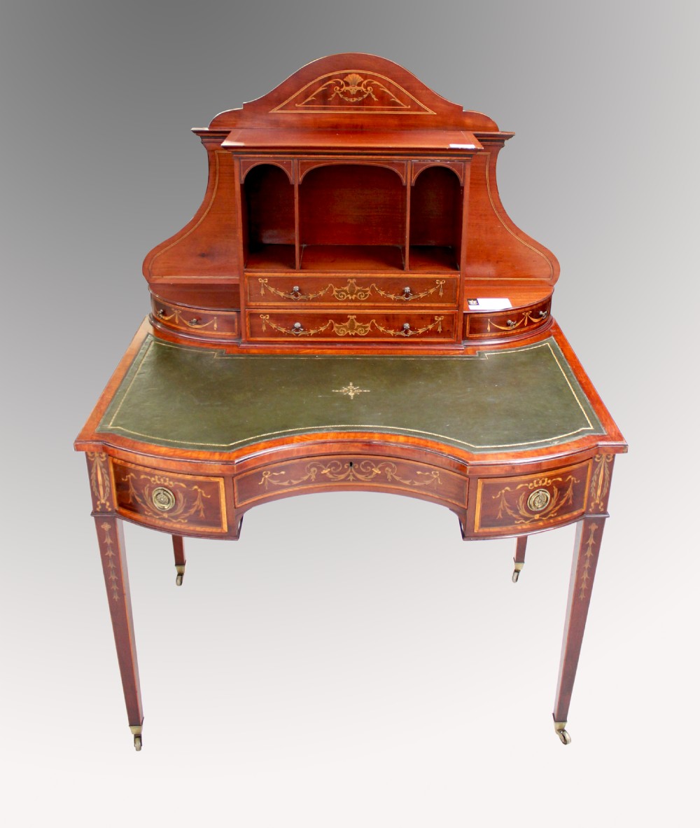 A BEAUTIFUL MAHOGANY INLAID CONCAVE WRITING DESK BY EDWARDS AND ROBERTS