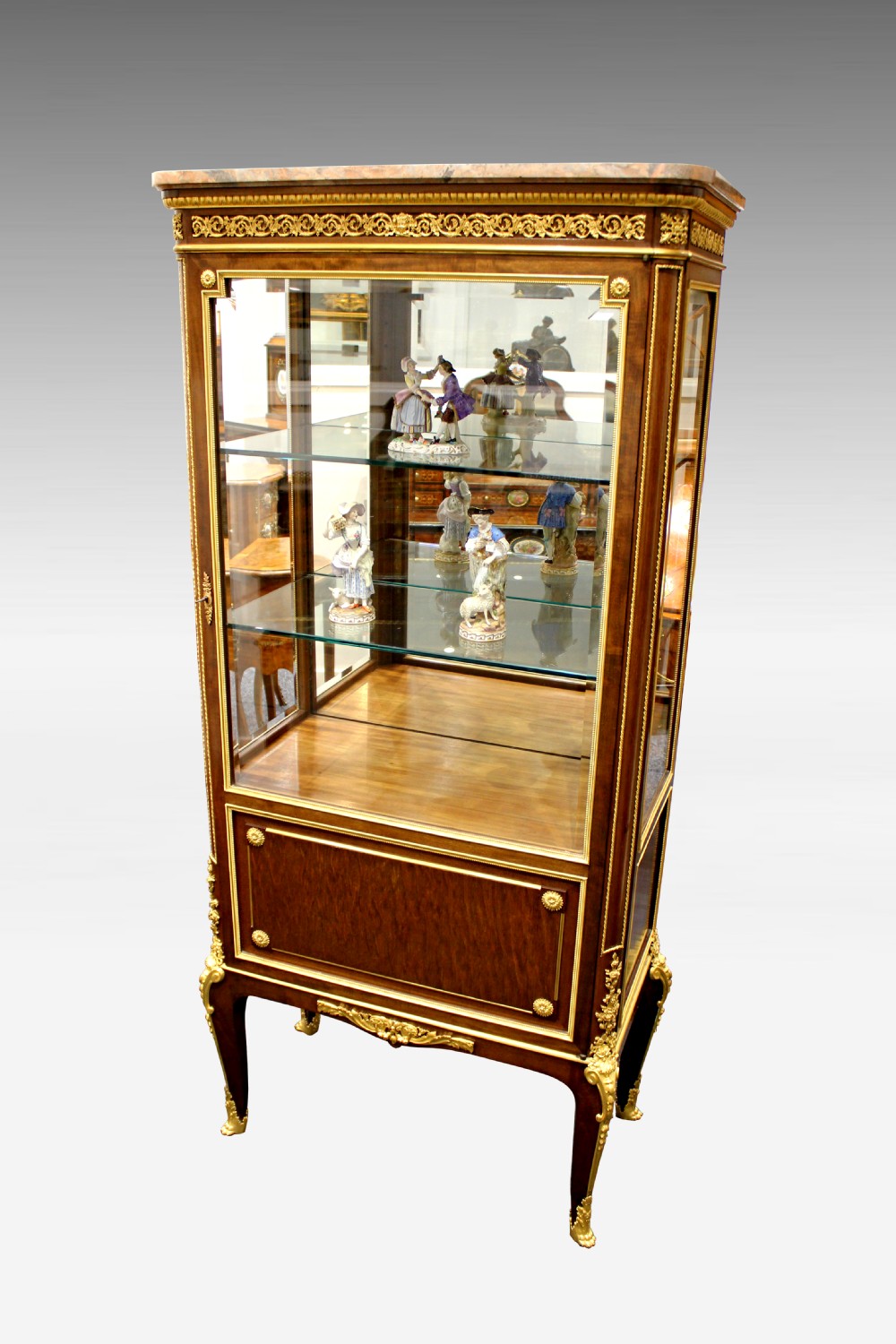 A 19TH CENTURY FRENCH MAHOGANY VITRINE CABINET ATTRIBUTED TO PAUL SORMANI