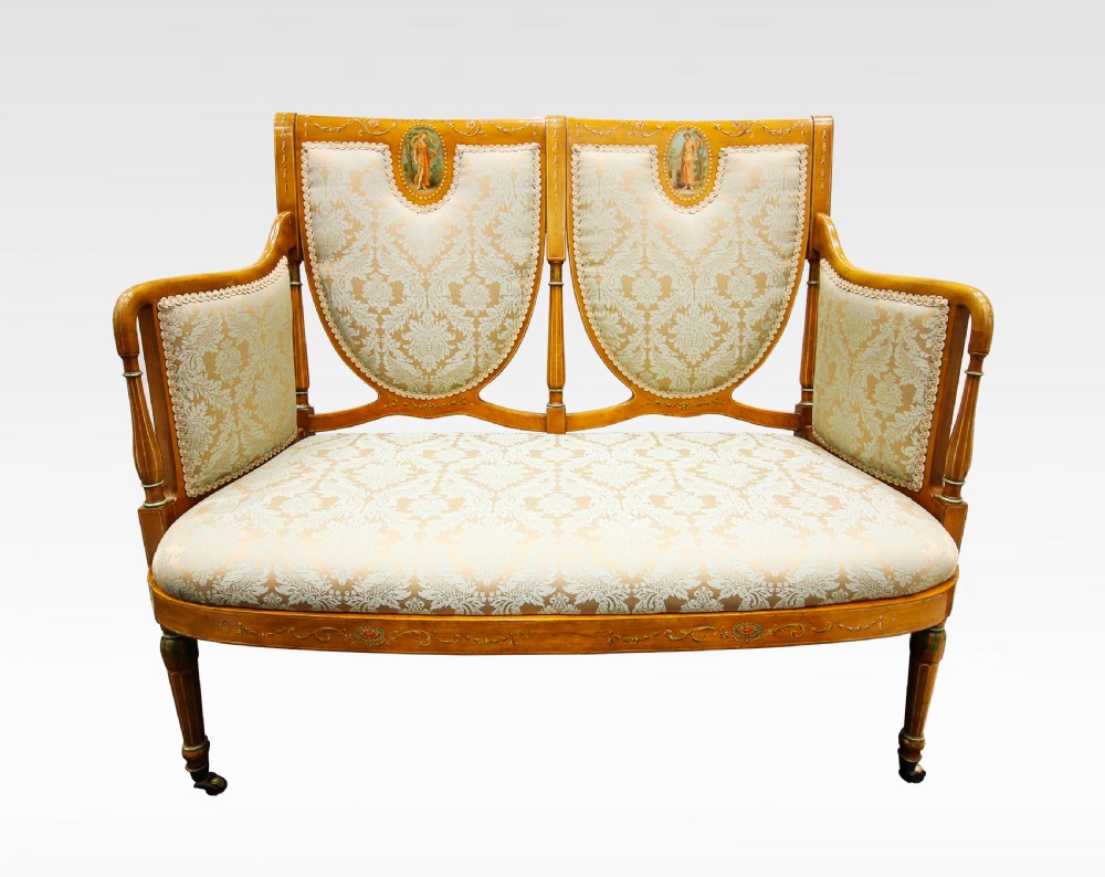 A VERY PRETTY SATINWOOD PAINTED UPHOLSTERED SETTEE 